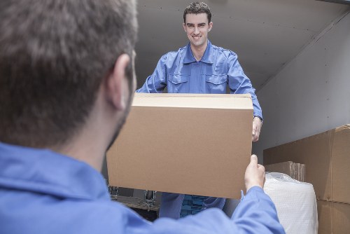 Office relocation planning in Mayfair with moving boxes and desks