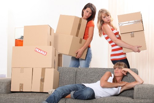 Professional movers working in a Mayfair apartment building